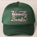 Green cap with 'Howdy Darlin' embroidered in pink on a light gray background