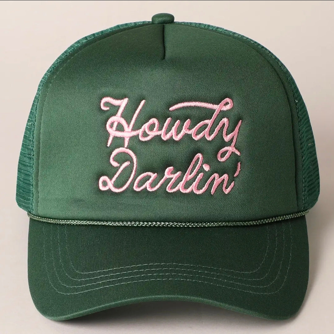 Green cap with 'Howdy Darlin' embroidered in pink on a light gray background